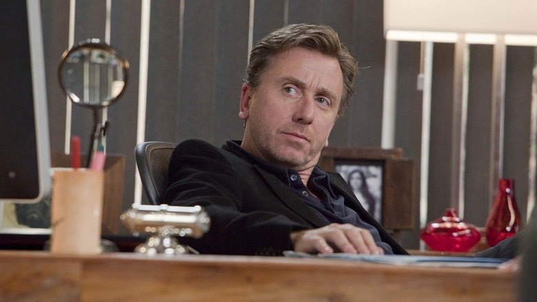 Dr. Cal Lightman sitting at desk