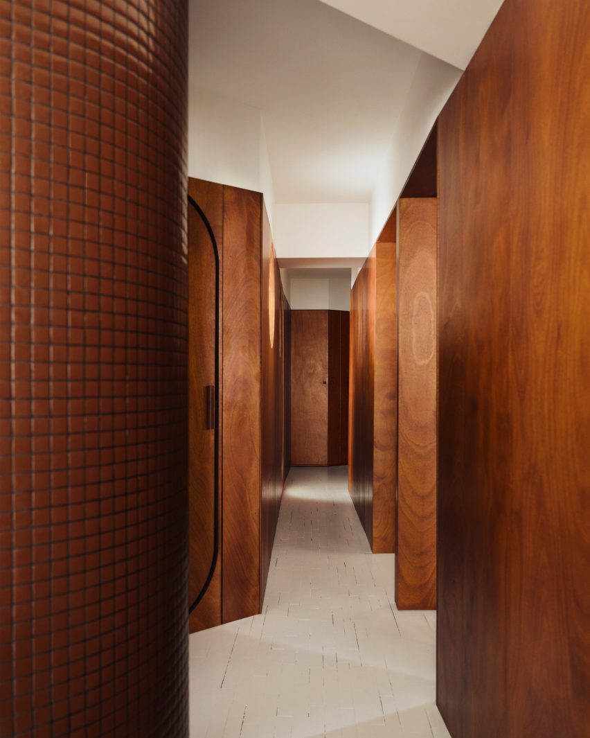Plywood corridor in Louise Chen's apartment