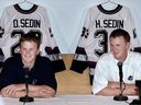The Sedin twins in July 2000, after signing their first NHL contracts. They'd been drafted just over a year before.