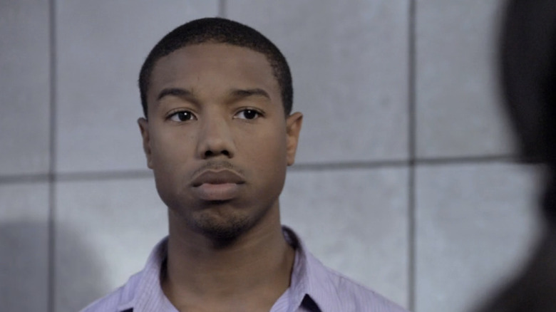 Michael B. Jordan as Perry Wilson looks serious on Bones