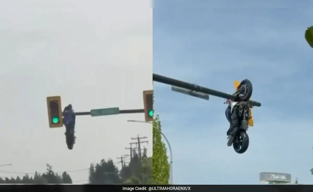 Motorcycle Left Hanging From Traffic Light After Crash In Canada, Rider Injured