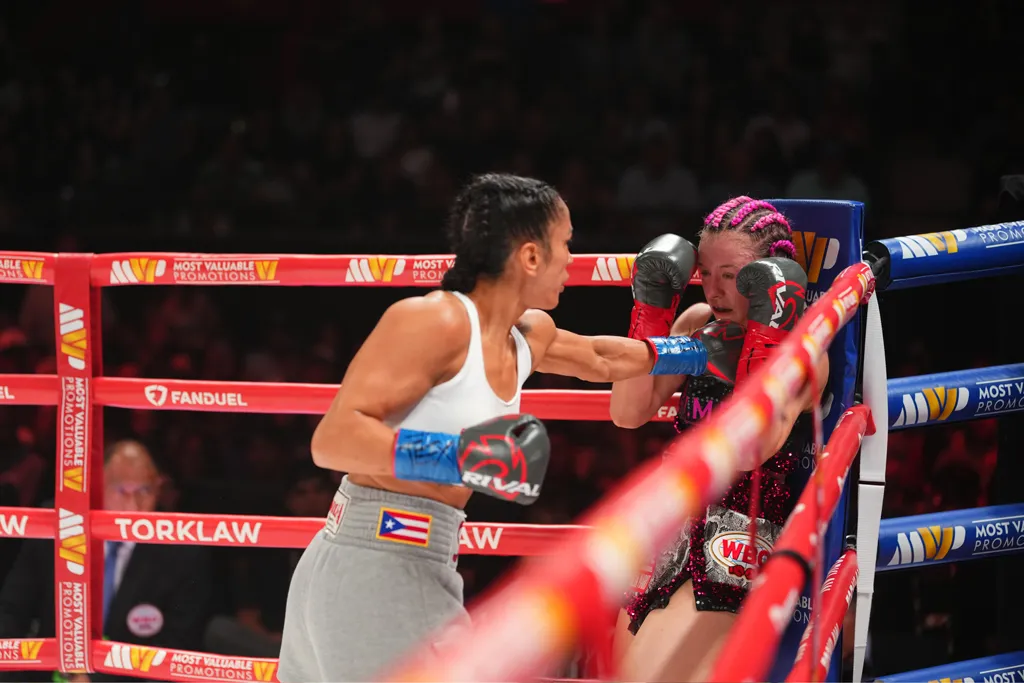 Amanda Serrano makes more history as she defends world titles with second-round stoppage win