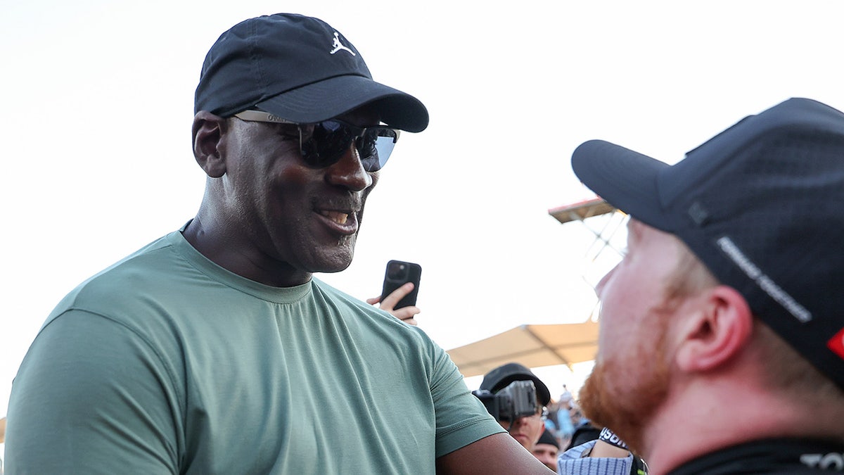 Michael Jordan celebrating with Tyler Reddick at Circuit of The Americas in Austin, Texas