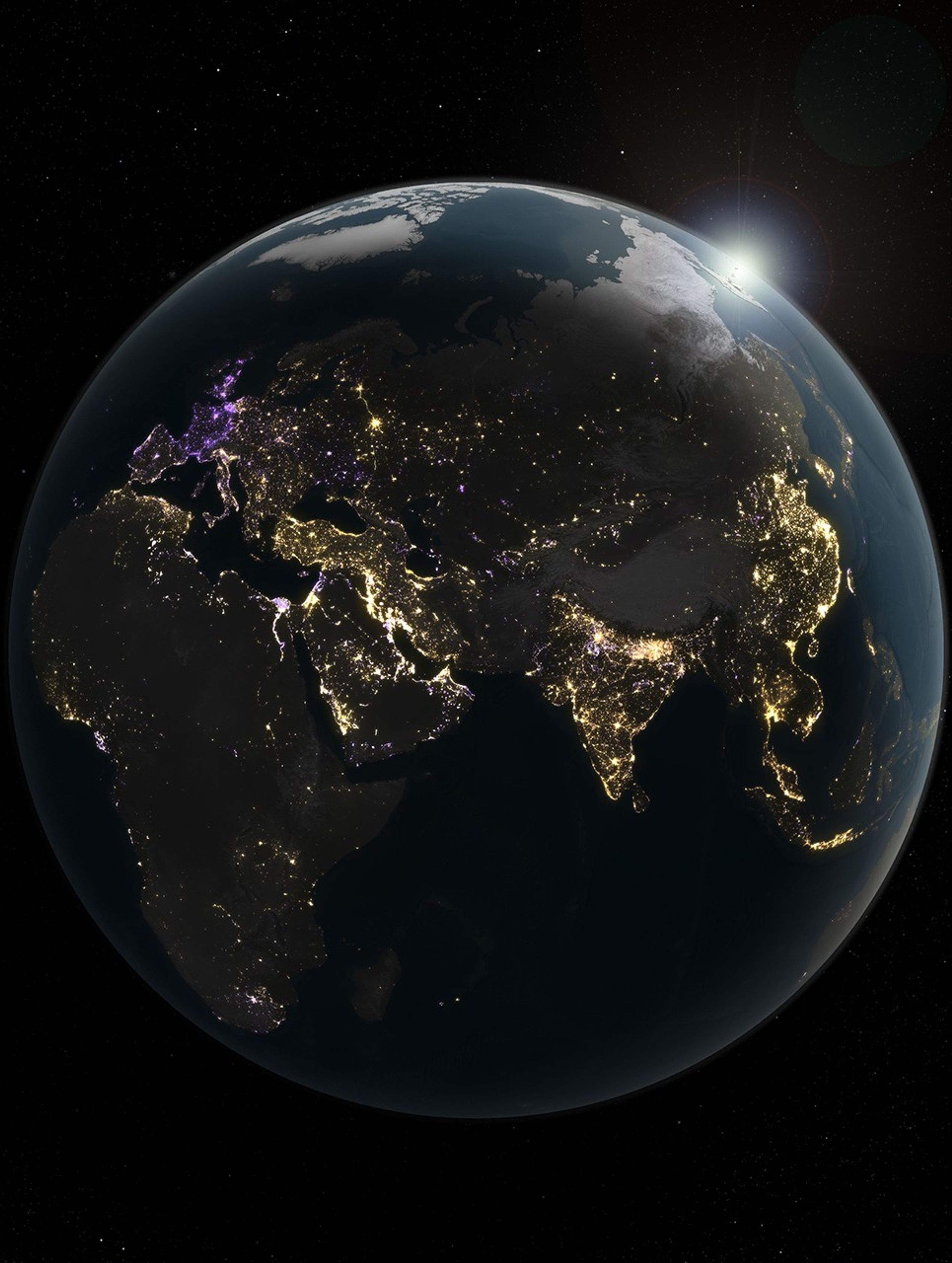 A data visualization shows changes in artificial light at night across the Eastern Hemisphere from 2014 to 2022, with increases shown in yellow and orange and decreases shown in purple.