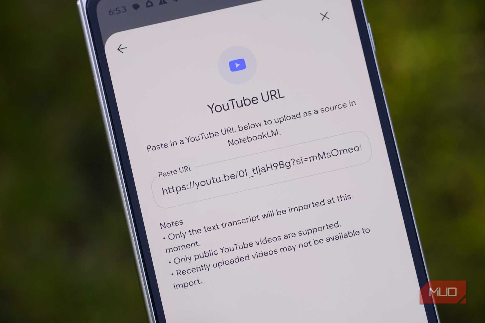 Adding a YouTube URL as the NotebookLM source.