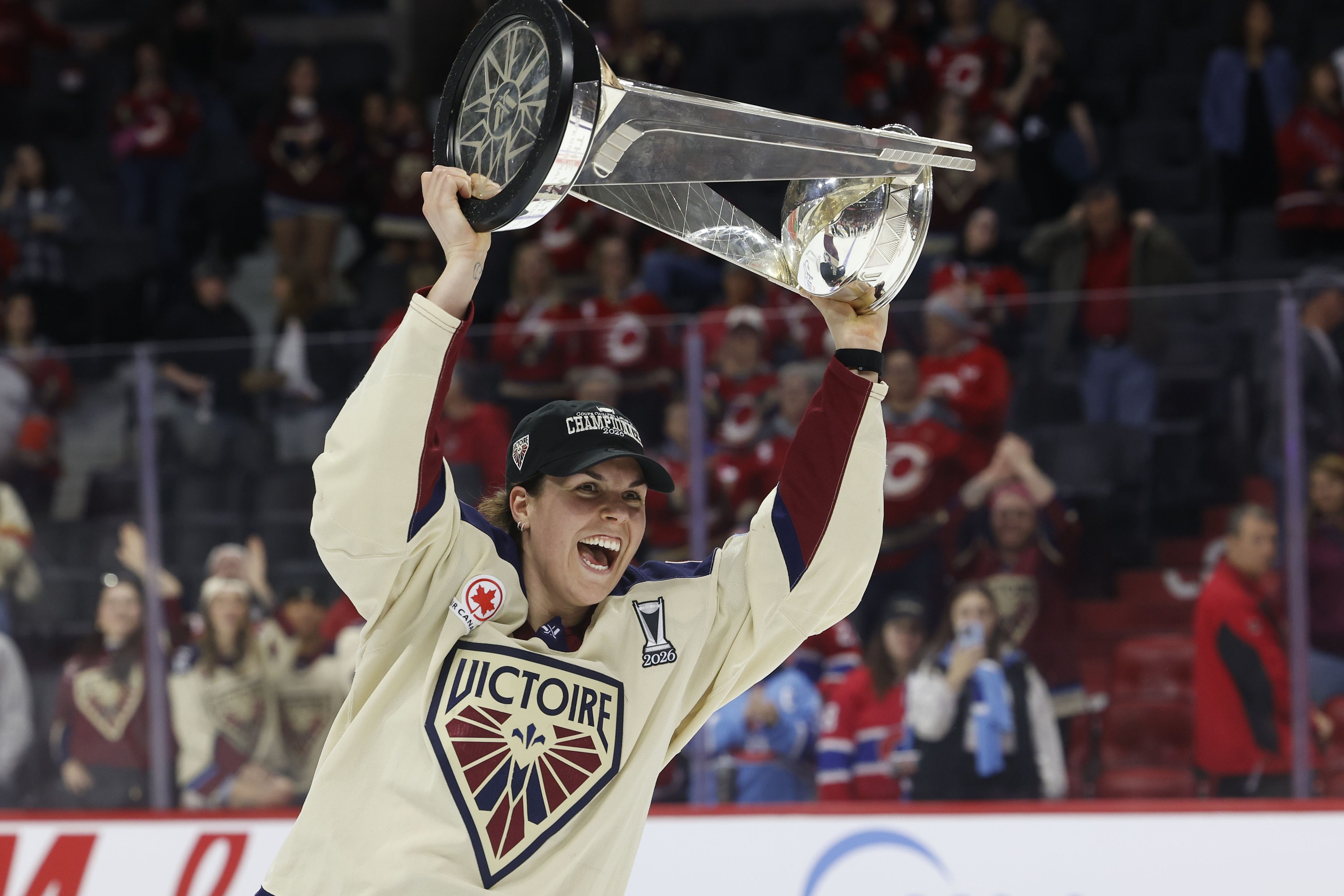 Montreal Victoire's Alexandra Labelle hoists the Walter Cup.