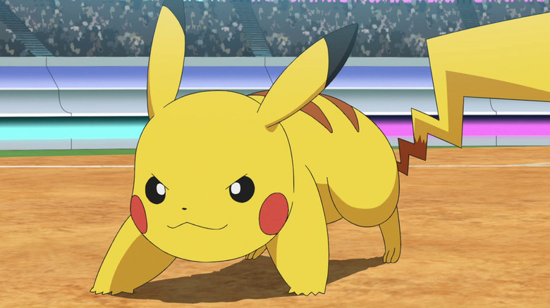 Pikachu on all fours and smiling in the Pokemon anime