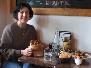 Sophia Milobar enjoys a meal at Chick Pea on Vancouver's Main Street.