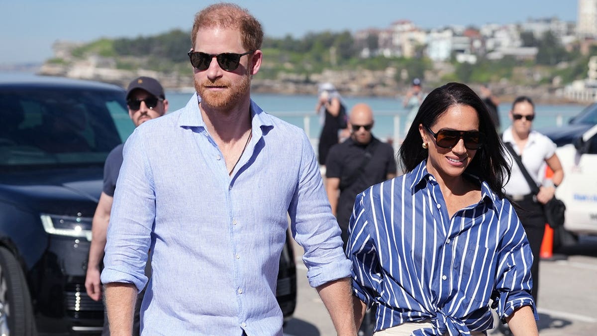 Prince Harry and Meghan Markle arriving at Bondi Beach in Sydney