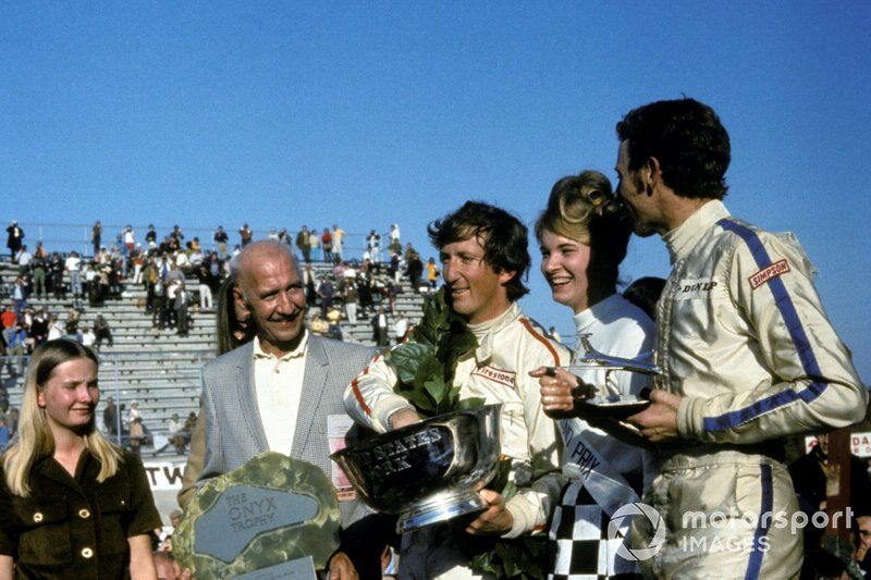 Rindt celebrates victory in the 1969 US GP, setting up a successful but tragic title a year later