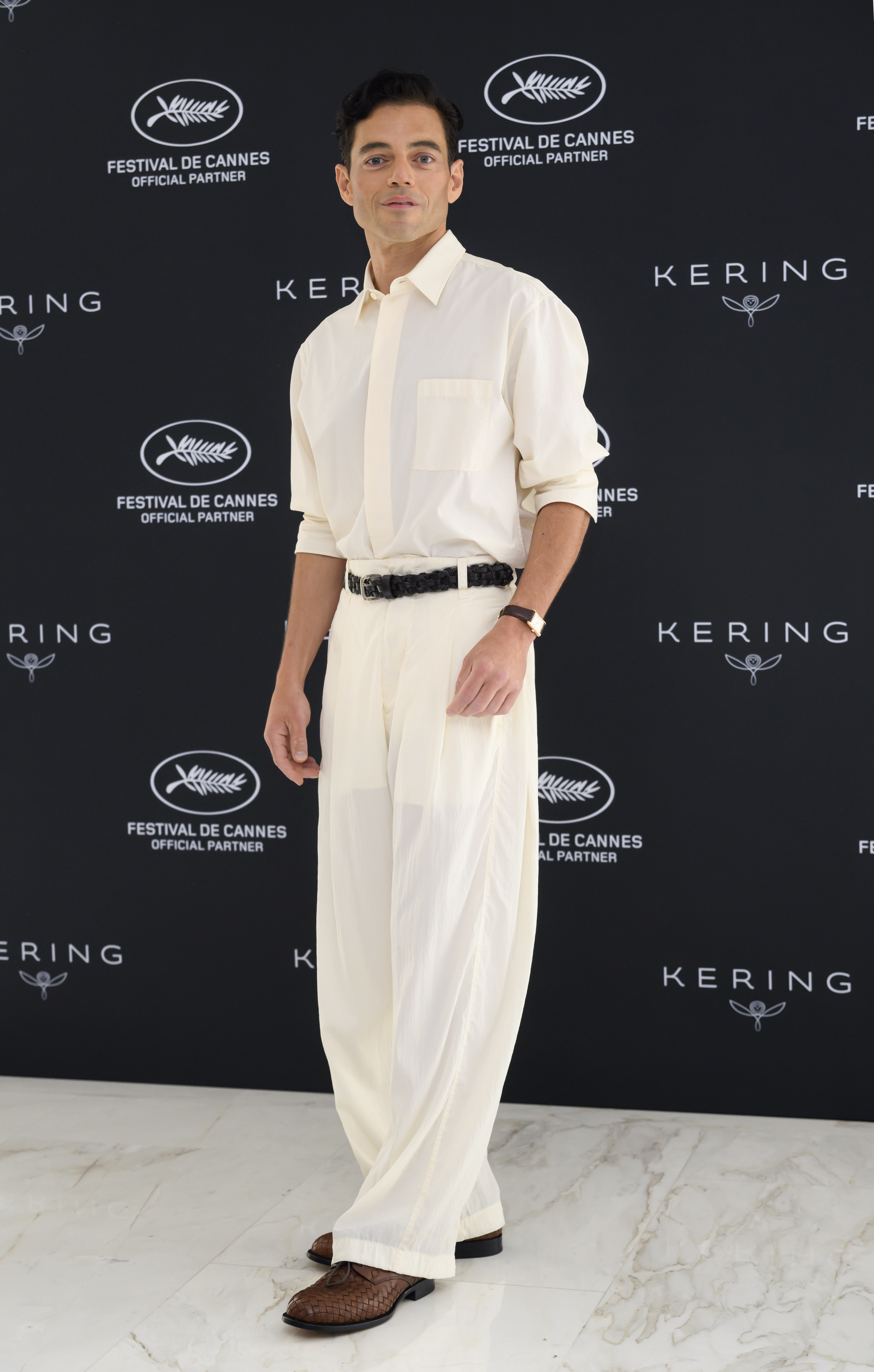 Rami Malek wearing The Row