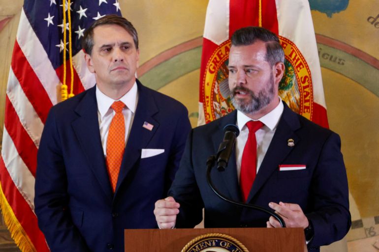 U.S. Attorney for the Southern District of Florida, Jason A. Reding Quinones speaks, while with Acting U.S. Attorney General, Todd Blanche, as the U.S. Department of Justice announces criminal charges against former Cuban President Raul Castro, during a ceremony to honor the victims of the 1996 shootdown of Brothers to the Rescue aircraft incident, at Freedom Tower in Miami, Florida, U.S., May 20, 2026. REUTERS/Marco Bello