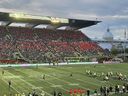 Fans watch the Ottawa Redblacks and Edmonton Elks play at Lansdowne Park in August 2025.