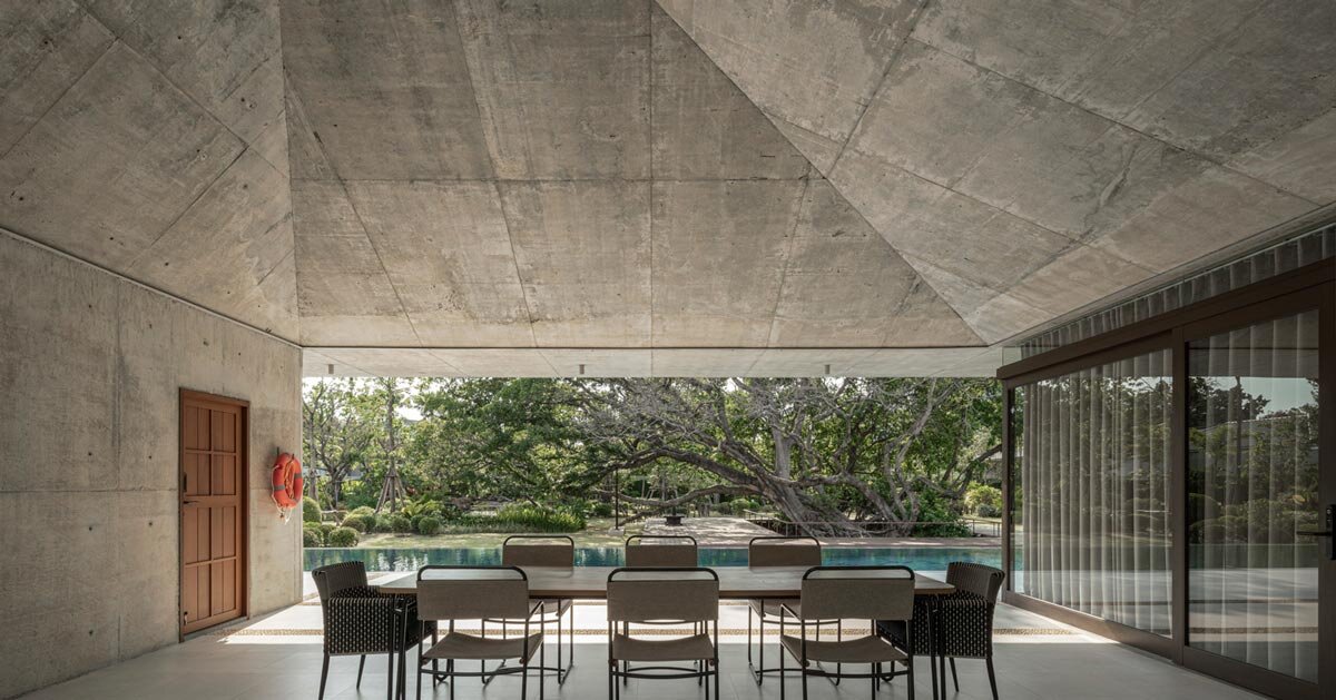anonym studio shapes saikhoo house around banyan trees in thailand
