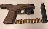 Peel Regional Police charged two men with firearm offences after a loaded Glock 17 was believed to have come in illegally from the United States.