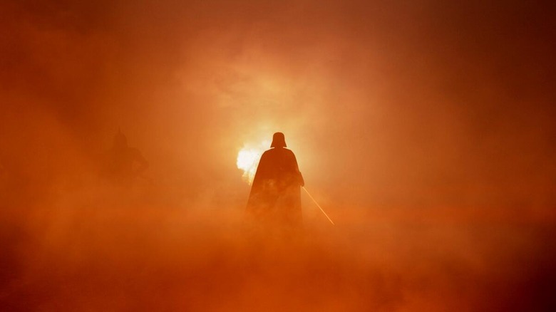 Darth Vader marches through the smoke of the Clone Wars in Ahsoka Tano's Force vision