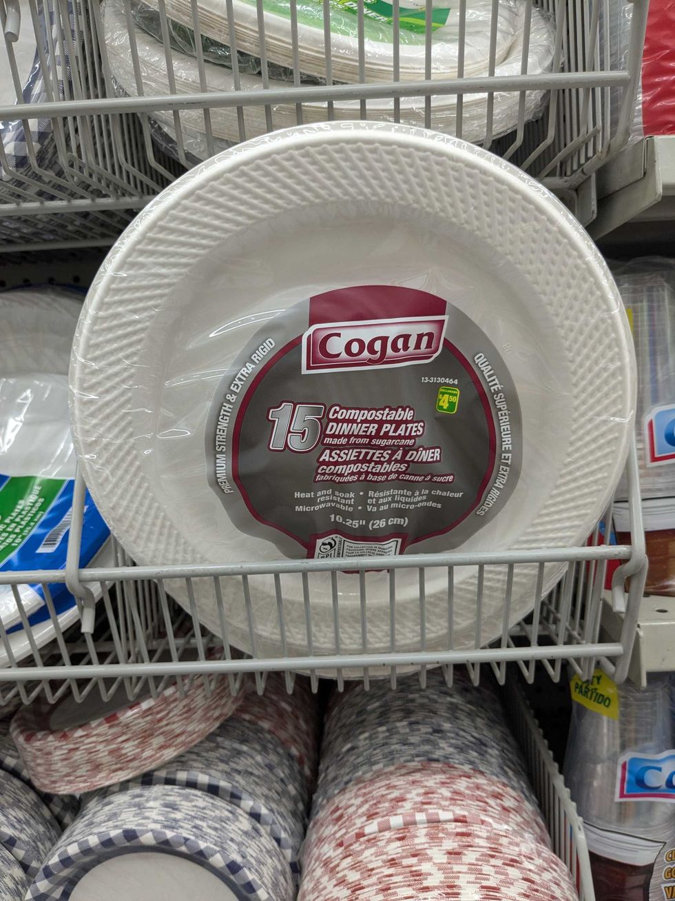 Shelf with disposable plates on it