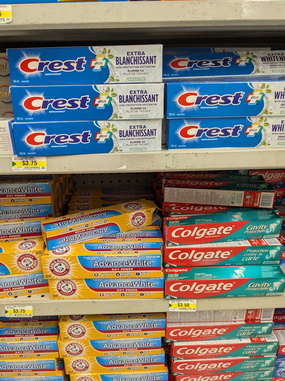 Shelves of toothpaste on a shelf in Dollarama