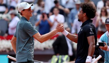 Jannik Sinner and Arthur Fils embrace following their Madrid semi-final on Friday.