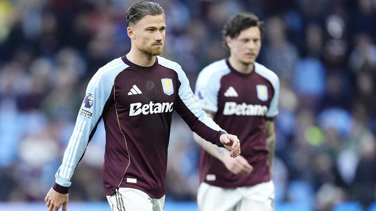 A disappointed Matty Cash and Victor Lindelof leave the pitch at half-time