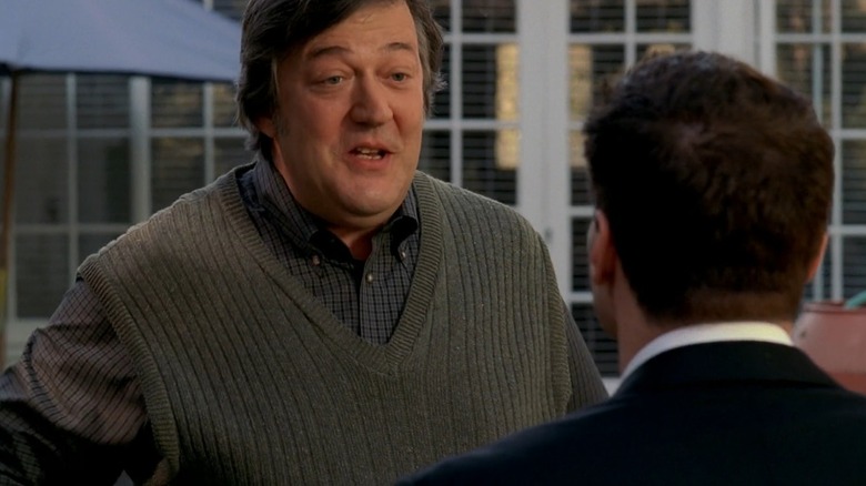 Stephen Fry as Dr. Gordon Wyatt talks to a patient in Bones