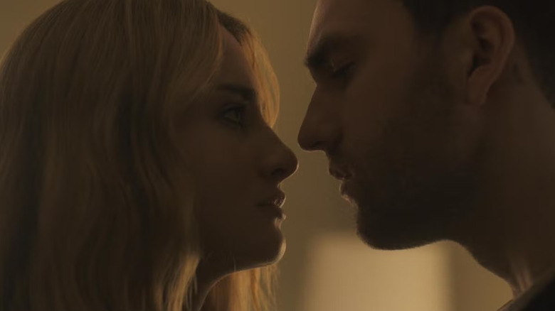 Grace Van Patten as Lucy and Jackson White as Stephen in Tell Me Lies nearing a kiss