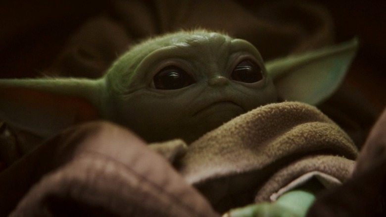 Grogu laying down, close-up