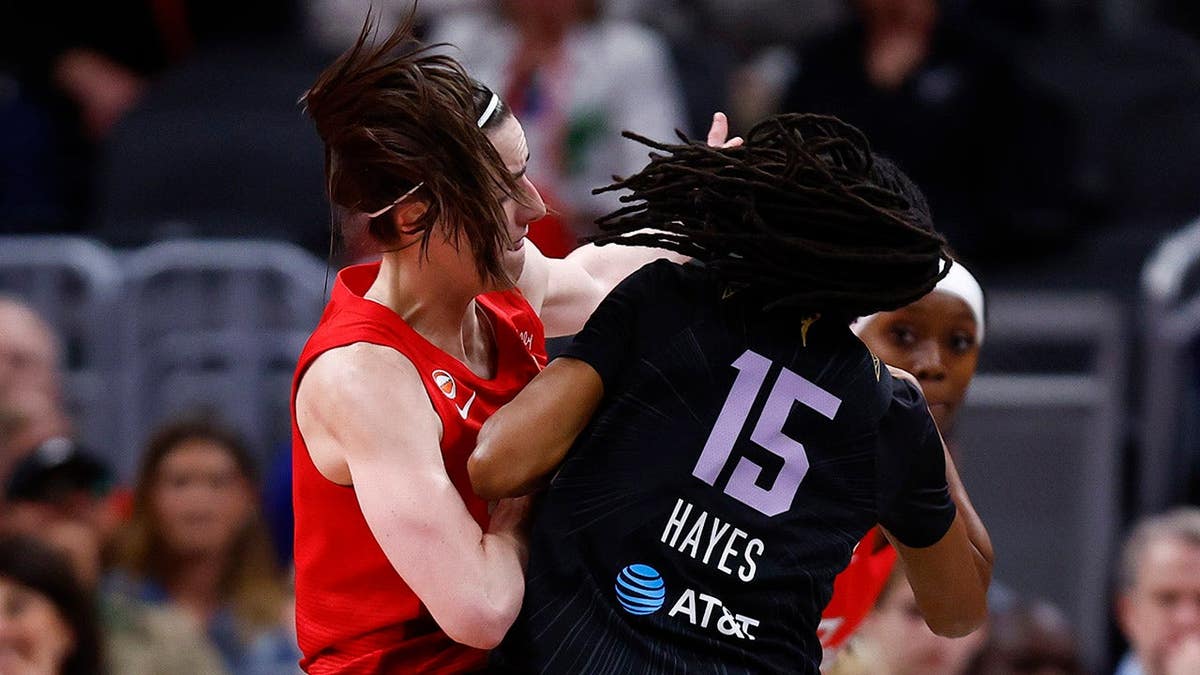 Tiffany Hayes colliding with Caitlin Clark during a WNBA game at Gainbridge Fieldhouse