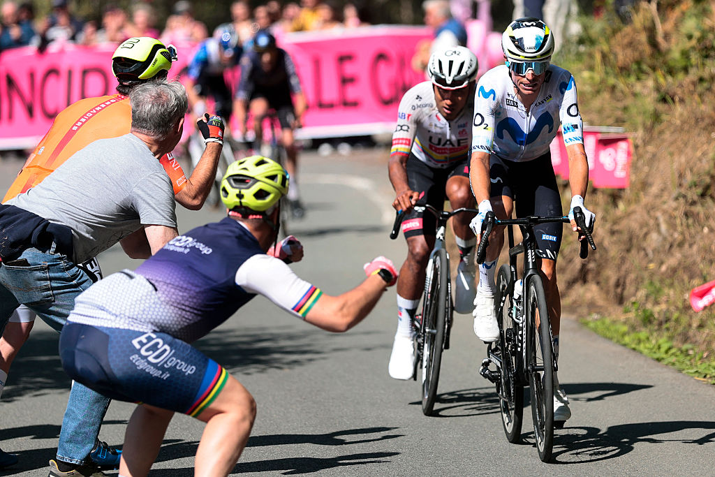 Movistar Team Spanish rider Enric Mas and UAE Team Emirates - XRG Ecuadorian rider Jhonatan Narvaez (L) ride in a breakaway during the 11th stage of the Giro d'Italia 2026 - Tour of Italy cycling race between Porcari and Chiavari, Italy, on May 20, 2026. (Photo by Luca Bettini / AFP)