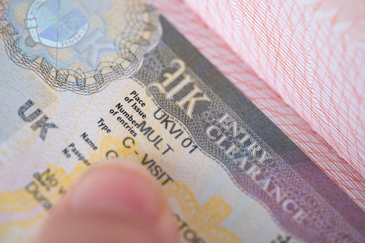 a close-up shot of a UK visa in someone's passport.