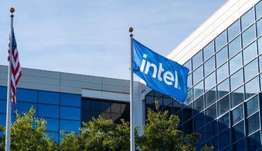 Intel flag waving in front of company headquarters.