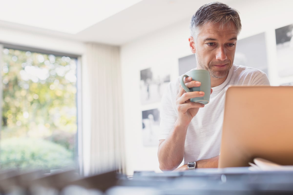 A person at a laptop.