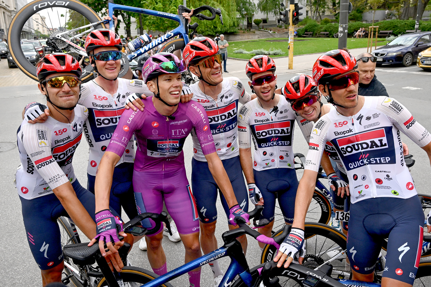 SOFIA, BULGARIA - MAY 10: Stage winner Paul Magnier of France and Team Soudal Quick-Step - Purple Points Jersey celebrates the victory of with his teammates Ayco Bastiaens of Belgium, Gianmarco Garofoli of Italy, Andrea Raccagni Noviero of Italy, Jasper Stuyven of Belgium, Fabio Van den Bossche of Belgium, Dries Van Gestel of Belgium, Filippo Zana of Italy after the 109th Giro d'Italia 2026, Stage 3 a 175km stage from Plovdiv to Sofia / #UCIWT / on May 10, 2026 in Sofia, Bulgaria. (Photo by Dario Belingheri/Getty Images)