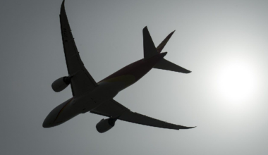A plane is silhouetted as it takes off from Vancouver International Airport in Richmond, B.C., Monday, May 13, 2019.