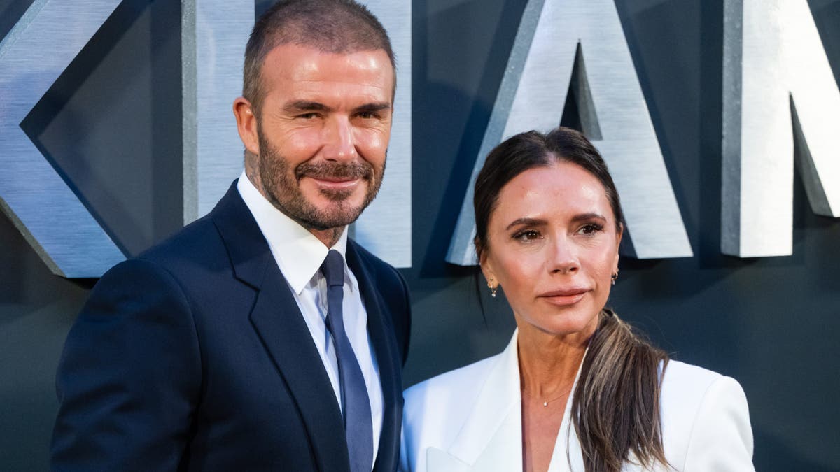 David Beckham and Victoria Beckham standing together at a premiere event in London