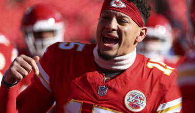 KANSAS CITY, MISSOURI - DECEMBER 14: Patrick Mahomes #15 of the Kansas City Chiefs gives a speech in the team huddle prior to the NFL football game against the Los Angeles Chargers at GEHA Field at Arrowhead Stadium on December 14, 2025 in Kansas City, Missouri.