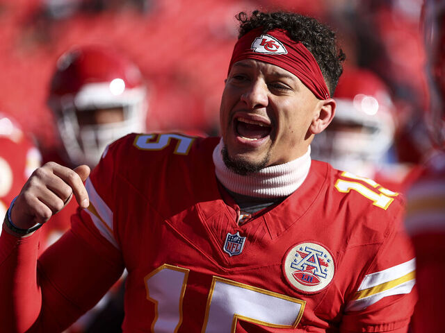 KANSAS CITY, MISSOURI - DECEMBER 14: Patrick Mahomes #15 of the Kansas City Chiefs gives a speech in the team huddle prior to the NFL football game against the Los Angeles Chargers at GEHA Field at Arrowhead Stadium on December 14, 2025 in Kansas City, Missouri.