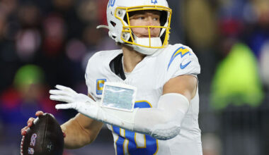 FOXBOROUGH, MASSACHUSETTS - JANUARY 11: Justin Herbert #10 of the Los Angeles Chargers in action during the AFC Wild Card Playoff game against the New England Patriots at Gillette Stadium on January 11, 2026 in Foxborough, Massachusetts.