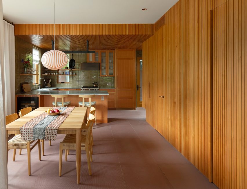 Timber-clad kitchen in a home in Vancouver