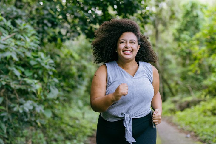 woman running in the natural park