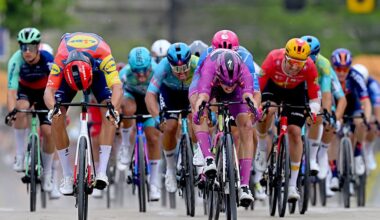 Jonathan Milan, Paul Magnier of France and Madis Mihkels sprint at finish line during the 109th Giro d'Italia