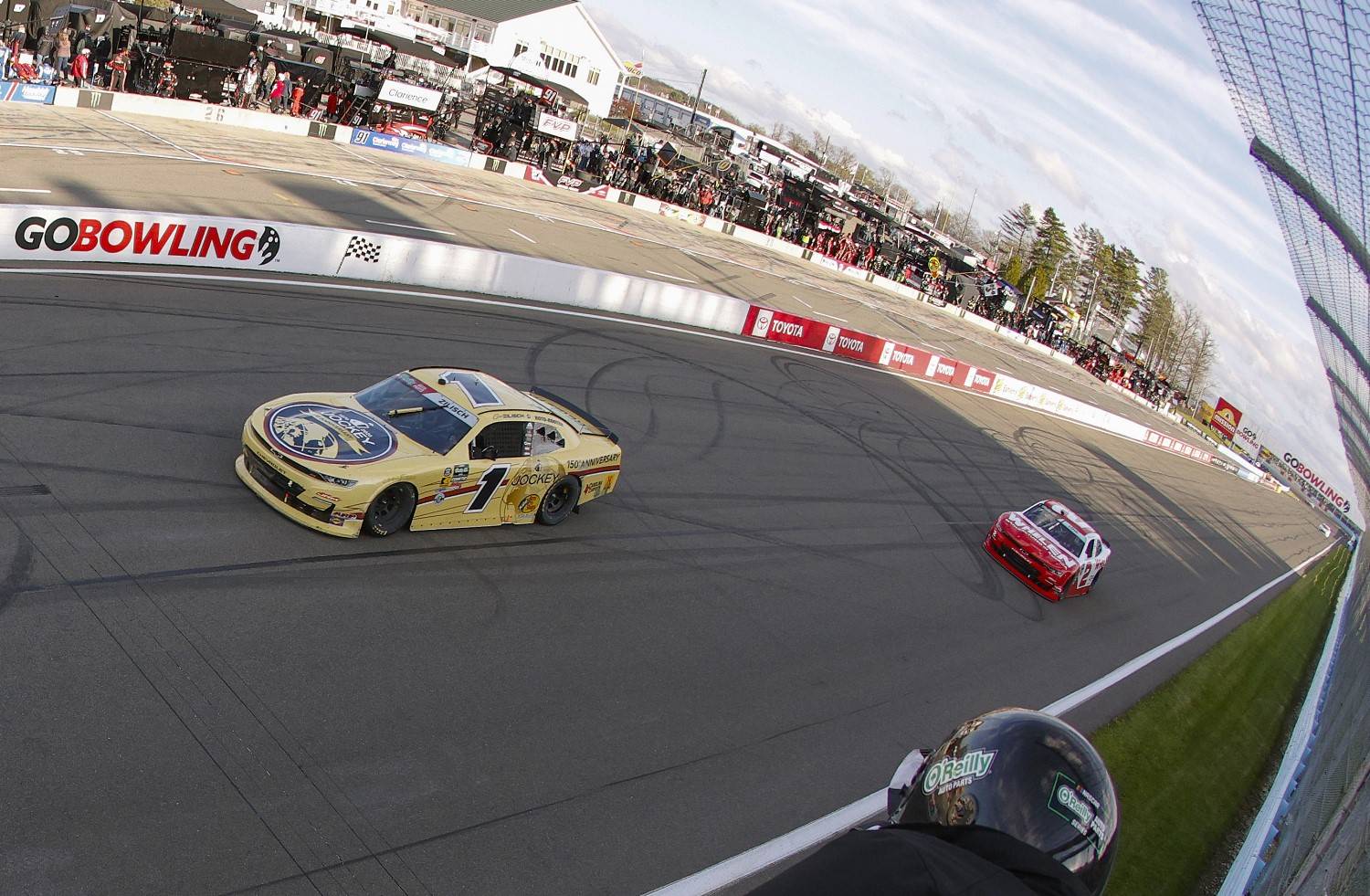 Connor Zilisch, driver of the #1 Jockey 150 Years Chevrolet, takes the checkered flag ahead of Jesse Love, driver of the #2 Whelen Chevrolet, to win the NASCAR O'Reilly Auto Parts Series Mission 200 at The Glen at Watkins Glen International on May 09, 2026 in Watkins Glen, New York. (Photo by Sean Gardner/Getty Images for NASCAR)