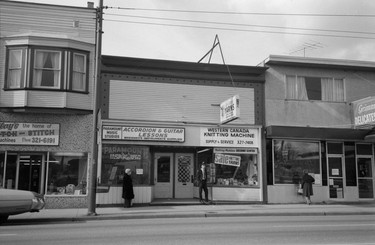 1974: 5927 Fraser St. Visible are the business signs for Paramount Music Studios, Yarns knitting store, and Grimm's Delicatessen.