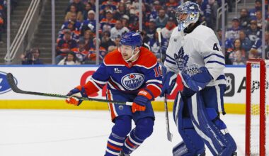 Feb 3, 2026; Edmonton, Alberta, CAN; Edmonton Oilers forward Zach Hyman (18) looks for a loose puck in front of Toronto Maple Leafs goaltender Anthony Stolarz (41) during the third period at Rogers Place. Mandatory Credit: Perry Nelson-Imagn Images