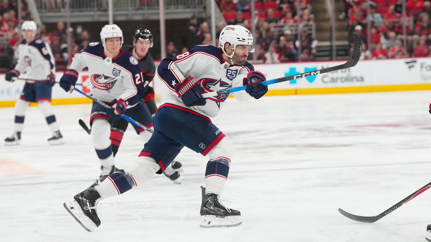 Apr 2, 2026; Raleigh, North Carolina, USA;  Columbus Blue Jackets center Boone Jenner (38) takes a shot against the Carolina Hurricanes during the second period t Lenovo Center. Mandatory Credit: James Guillory-Imagn Images