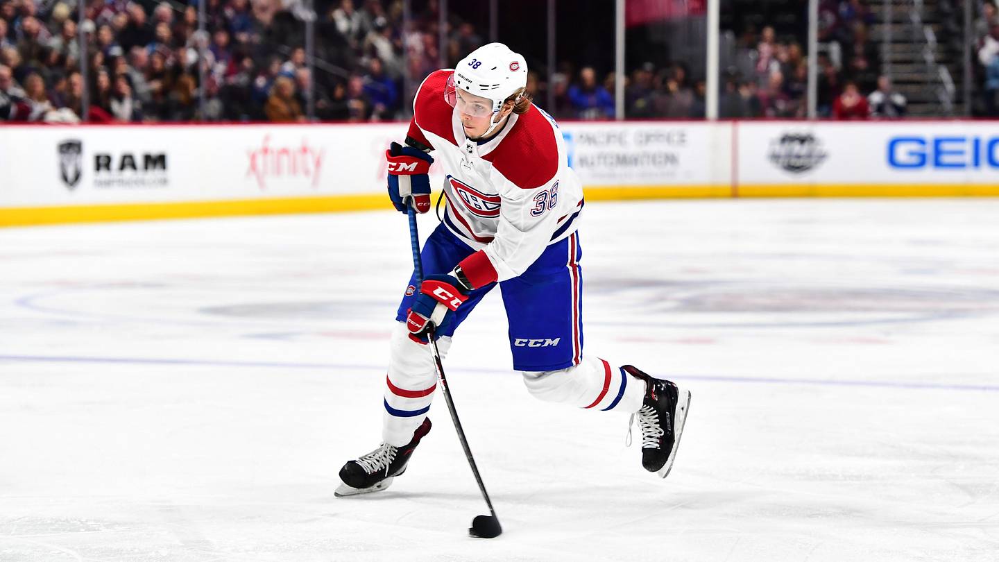 Feb 14, 2018; Denver, CO, USA; Montreal Canadiens right wing Nikita Scherbak (38) takes a shot on goal in the third period against the Colorado Avalanche at the Pepsi Center. Mandatory Credit: Ron Chenoy-Imagn Images