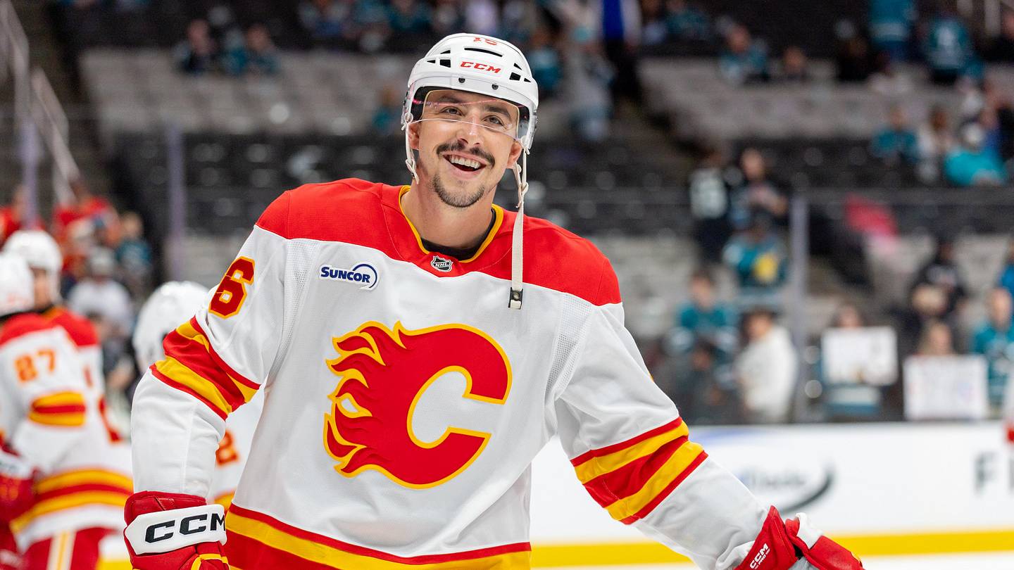 Feb 26, 2026; San Jose, California, USA; Calgary Flames center Morgan Frost (16) warms up before the game against the San Jose Sharks at SAP Center at San Jose. Mandatory Credit: Bob Kupbens-Imagn Images