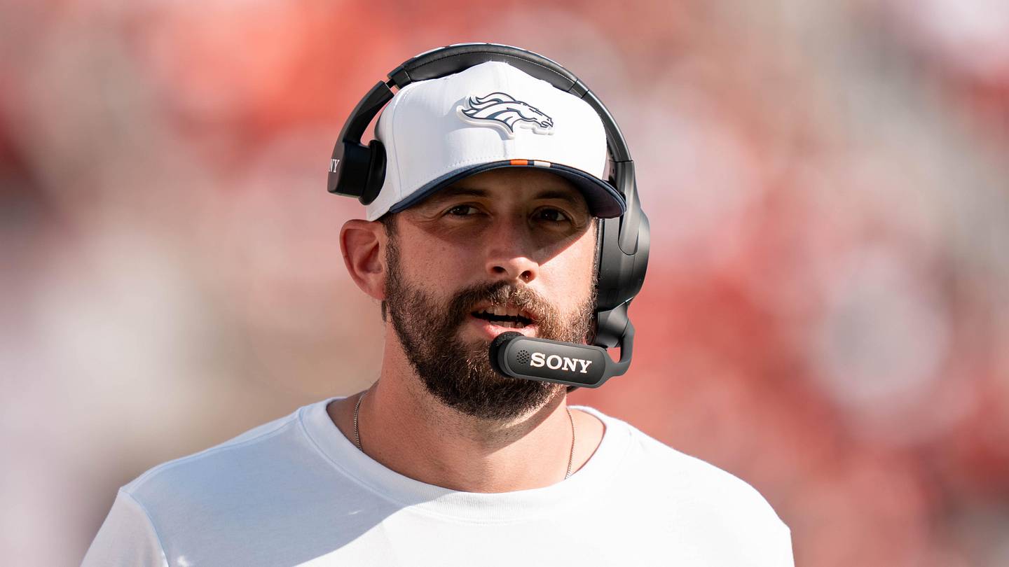 Denver Broncos coach Davis Webb
