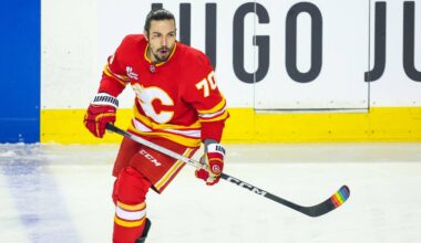 Jan 5, 2026; Calgary, Alberta, CAN; Calgary Flames left wing Ryan Lomberg (70) skates during the warmup period against the Seattle Kraken at Scotiabank Saddledome. Mandatory Credit: Sergei Belski-Imagn Images