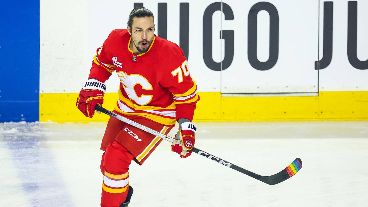 Jan 5, 2026; Calgary, Alberta, CAN; Calgary Flames left wing Ryan Lomberg (70) skates during the warmup period against the Seattle Kraken at Scotiabank Saddledome. Mandatory Credit: Sergei Belski-Imagn Images